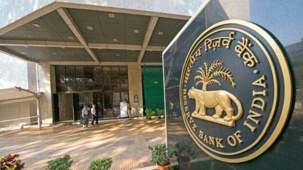 A person holding a wooden see-saw balancing a percentage sign and a small house model.