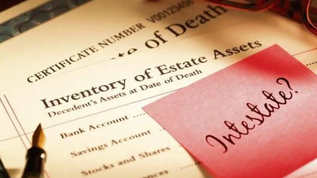 A document titled "Inventory of Estate Assets" is seen alongside a "Certificate of Death." A red sticky note with the handwritten word "Intestate?" is placed on top.
